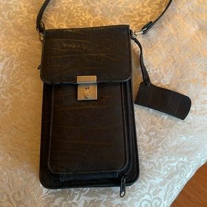 Black travelers bag designed for passport